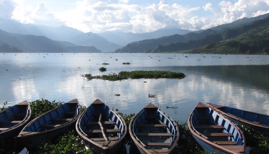 Phewa Lake Boating: Serenity and Majestic Views Unite on the Tranquil Waters of Pokhara.
